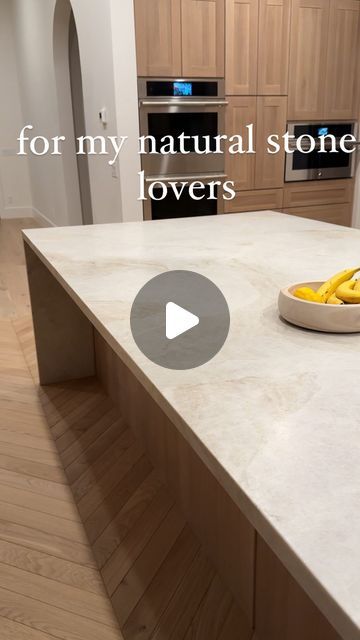 Karli Jones🦷 | design inspo + easy DIY on Instagram: "Quartz is out and natural stone is making a big comeback 🗿. Natural stone was so intimidating to me and I wanted to stick with man-made quartz but I’m so happy we took the leap with something natural. It’s so much more durable than I realized & you can’t beat that variation in veining. Would you install a natural stone in your kitchen or are you team quartz? ✨follow @karlibree for more design inspo✨ ✨save this to your kitchen inspo folder✨ #naturalstone #marbleslab #quartziteslab #granitestone #naturalstonekitchen #organicmaterial" Quartz Stone Kitchen, Leathered Taj Mahal Quartzite Kitchen, Caesarstone Organic White Quartz Countertops, Taj Mahal Quartzite Countertops Kitchen, Taj Mahal Kitchen, Taj Mahal Quartzite Kitchen, Countertop Ideas, Kalinga Stone Quartz, Tan Majal Quartzite Kitchen