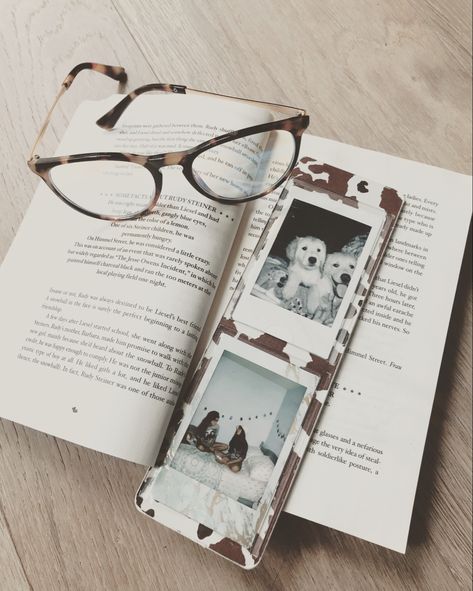 Glasses On Book Aesthetic, Brown Aesthetic Bedroom, Polaroid Picture Book, Polaroid Bookmark, Clear Phone Cases Aesthetic Polaroid, Polaroid In Phone Case Aesthetic, Book Thief, Bedroom Book, Markus Zusak