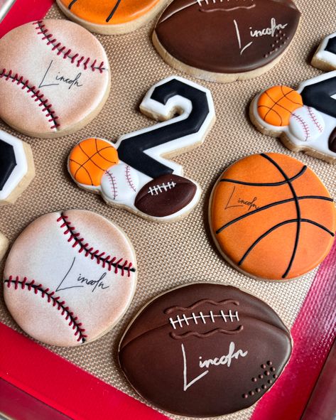 Born Two Ball themed. Love the look of the signature on the balls ☺️ Born 2 Ball Cookies, Sports Themed Cookies, Born 2 Ball Birthday Cake, Born Two Ball Birthday Theme, Born To Ball Birthday Theme, Born Two Ball Birthday, Born 2 Ball Birthday Party, Born 2 Ball Birthday, Ball Themed Birthday Party