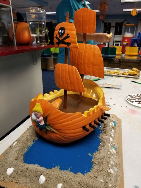 Jaik’s pumpkin carving for contest at work. Pirate ship pumpkin. Pirate Ship Pumpkin, Halloween Pumpkins Carvings Designs, Diy Pumpkin Carving, Pirate Pumpkin, Pumkin Decoration, Creative Pumpkin Decorating, Pumkin Carving, Pumpkin Carving Contest, Pumpkin Decorating Contest