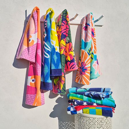 You'll love toting this Outdoor Oasis beach towel on your next vacation. Made from 100% cotton, it features a vibrant multicolor floral print and is midweight for added durability. Mix and match with other styles from the brand's collection. Included: 1 30x60 Inch Beach Towel(s)Measurements: 60 Length/Inches, 30 Width/InchesBase Material: 100% CottonCare: Machine WashFabric Weight: Midweight (450-599 Gsm)Towel Type: Beach TowelsCountry of Origin: Imported Flamingo Beach Towel, Family Swimming, Pink Beach Towel, Yellow Towels, Flamingo Print, Pineapple Print, Swimsuit Shops, Outdoor Oasis, Brand Collection