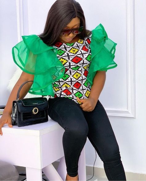 40 Stylish Ankara Blouse Styles For 2022 - The XO Factor Ankara Flare Tops, Ankara Blouse And Skirt, Ankara Blouse Styles, Organza Top Styles, Ankara Blouses, African Elegance, Ankara Blouse, Ankara Skirts, Pattern Draping