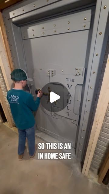 Lange Custom Builders - NW Ohio General Contractor on Instagram: "Check out this VAULT DOOR! This is an in home safe that we have added to this build. The room is encapsulated in concrete and secured with this @smithsecuritysafes beautiful safe door. We will be sharing more details about this but it is installed and looking great! #safe #safedoor #vault #vaultdoor #construction #newbuild #build #newhome #concrete" Hidden Safe Room Door, Vault Room Ideas, Built In Safe Room, Small Safe Room Ideas, Basement Safe Room Ideas, Hide Safe Ideas, Secret Safe Rooms In Houses, Gunsafe Ideas, Closet Safe Room