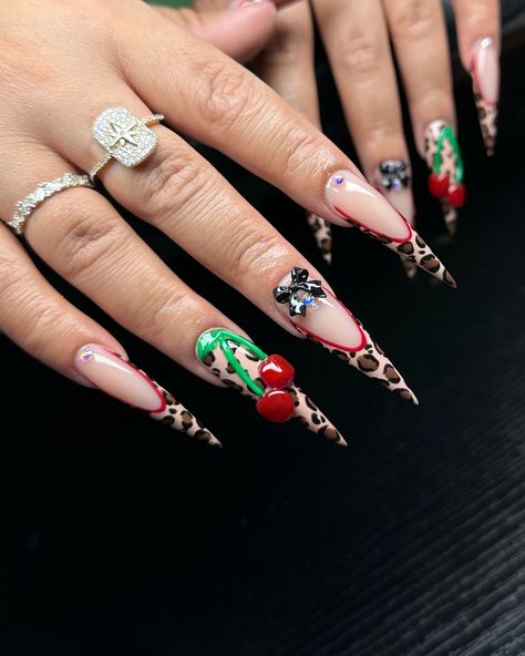 This cheetah with these cherries is everything 🐆 🍒 #stiletto #cheetah #cherries #3d #nailart #nailinspo #nailsnailsnails #xlnails # Stilleto Cheetah Nails, Stiletto Nails Cheetah, Cherry Nails Stiletto, Gold And Cheetah Nails, Cherry Inspo Nails, Cheetah Nails Stiletto, Stiletto Leopard Nails, Cheetah Print Nails With Cherry, Cheetah Print Nails With Red