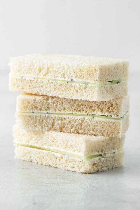 These dainty and delicate tea sandwiches are a quintessential part of afternoon tea. They easy to make and require no cooking. Cheese Cucumber Sandwich, Cucumber Sandwiches With Cream Cheese, Cucumber Tea Sandwiches Recipes, Cucumber And Cream Cheese, Sandwiches With Cream Cheese, Cream Cheese Tomato, Cream Cheese Cucumber, Tea Party Sandwiches Recipes, Cream Cheese Sandwich