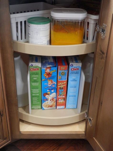 I have a love/hate relationship with my lower Lazy-Susan. We store cereals, chips, crackers, oils and larger bottles of things on the lower tray. The cereal boxes get tipped over when we spin the tray, the chip bags get smashed and a good amount of both get lodged between the wall and the tray in that unreachable outer limits.  I searched and searched for a solution and ordered the expensive wedge bins ($16.99 each!!!) that didn’t fit. Returned them at Bed, Bath and Beyond and got the… Kitchen Watch, Lazy Susan Cabinet, Diy Kitchen Makeover Ideas, Under Cabinet Storage, Minimalist Side Table, Coffee Mug Holder, Rustic Tray, Kitchen Diy Makeover, Clutter Organization