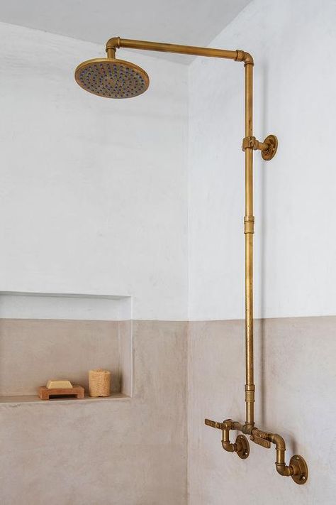 An antique brass exposed plumbing shower kit is mounted on color block two tone shower walls with a two tone shower niche. Exposed Plumbing Bathroom, Vine Rack, Contemporary Kids Room, Boy Nursery Design, Exposed Plumbing, Polka Dot Curtains, Green Painted Walls, Contemporary Nursery, Vintage Crib