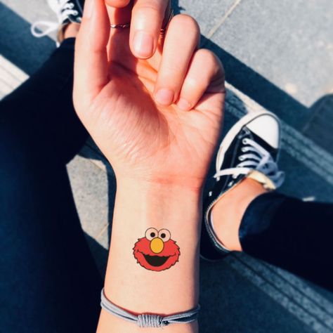 Elmo Tattoo Ideas, Sesame Street Tattoo, Elmo Tattoo, Elmo Sesame Street, Street Tattoo, Cartoon Tattoos, Temporary Tattoo Stickers, Tattoo Sticker, Tattoo Inspo