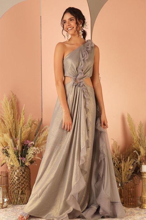 Buy grey one shoulder #gown with #ruffles detail, front pleated & bead work side cutouts by #GeishaDesigns at #AzaFashions Shop online now at #Azafashions.com Call +91 8291990059 or email contactus@azafashions.com for enquiries. #wedding #festive #ethnic #tradional #shopping #shoponline #party #reception #bride Heavy Outfit, Gown With Ruffles, Indowestern Dresses, Brother Wedding, Reception Bride, Party Reception, Cutout Gown, Ruffle Gown, Draping Fashion