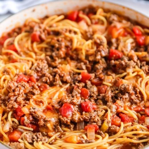 Taco spaghetti is a taco flavored spaghetti dish that is ground beef, Rotel, tomato sauce, cheese and of course pasta. A one pot dinner idea to try this week. This Mexican spaghetti is great for a busy weeknight or when you want something different than just tacos. One Pot Taco Spaghetti, Taco Spaghetti Recipe, Spaghetti Tacos, Mexican Spaghetti, Recipe Ground Beef, Taco Pasta Recipes, Spaghetti With Ground Beef, Baked Spaghetti Recipe, Taco Spaghetti