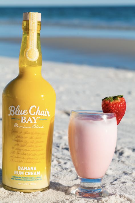 Fill a shaker with ice. Pour Blue Chair Bay Banana Rum Cream and Real Strawberry Infused Syrup into the shaker and shake vigorously. Strain the cocktail into a glass over ice.Slowly pour in the club soda for the perfect fizz.Garnish with a strawberry. Banana Rum Drinks, Strawberry Banana Recipes, Bananas Recipe, Banana Rum, Rum Cream, Coctails Recipes, Liquor Recipes, Rum Recipes, Vodka Cocktails Recipes