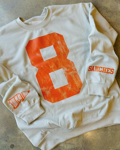 SNEAK PEEK!! 😍 We are launching some new fun designs for fall this Friday 🥳 and we could use your help getting the word out! As a BIG thank you we want to gift TWO of you one of our NEW CUSTOM sweatshirts 👏🏻👏🏻 To help us is simple: ✔️Like this post ✔️Tag your sports mom friends ✔️Share in stories (if your page is private please let us know you shared 😉) Launch is live at 8am Friday morning! We will announce the 2 winners that morning here! We are so excited about these customs tops!... Games For Moms, Soccer Mom Shirt, Sports Sweatshirt, Mom Friends, Add Sleeves, Custom Top, Football Mom Shirts, Football Sweatshirt, Shirt Football