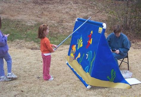 Fishing at a church carnival booth was fun, but being old enough to be the one behind the curtain clipping prizes on the line was a real blast! Fall Festival Fishing Game, Fishing Booth Carnival Game, Go Fish Carnival Game, Fishing Themed Games, Halloween Fishing Game, Church Festival Games, Carnival Fishing Game, Church Harvest Festival, Halloween Carnival Games