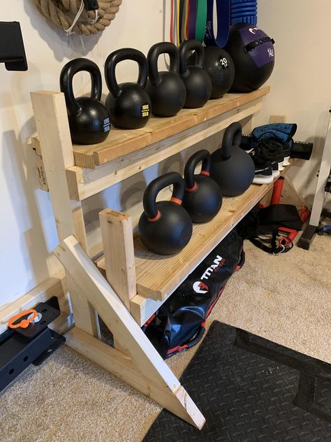 Homemade Kettlebell equipment storage rack Kettlebell Rack Storage, Diy Workout Equipment Storage, Diy Kettlebell Rack, Kettlebell Storage Diy, Homemade Kettlebell, Diy Kettlebell, Kettlebell Storage, Gym Organization, Fitness Artwork