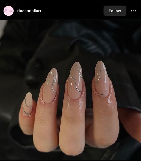 Here Are The 15 Coolest Fall 2023 Nail Trends To Obsess Over Almond Nails Silver Design, Medium Almond Nails Designs Classy, Almond Nails Ideas Neutral, Aesthetic Almond Nails Designs, Nails Inspiration Almond Classy, Nude Nails With Simple Design, Nude Nail With Design, Almond Nail Styles, Nude Nails Design 2024