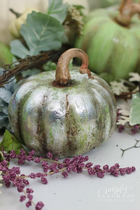 Over 25 Ways to DIY a Craft Store Pumpkin | ANDERSON+GRANT Pumpkin With Feathers, How To Cover A Pumpkin With Fabric, Embellished Pumpkins, Heirloom Pumpkins, Diy Home Decor For Apartments, Dollar Tree Pumpkins, Fall Pumpkin Crafts, Glamorous Decor, Pumpkin Painting Ideas