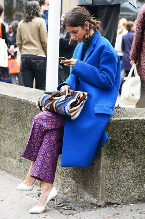 Shop this look on Lookastic:  https://lookastic.com/women/looks/coat-wide-leg-pants-pumps-clutch-earrings/8098  — Orange Earrings  — Blue Coat  — Blue Print Fur Clutch  — Purple Print Wide Leg Pants  — White Leather Pumps Cobalt Dress, Mode Prints, Mode Hippie, Cool Winter, Queer Fashion, Flare Pant, Blue Coat, Layering Outfits, Blue Coats