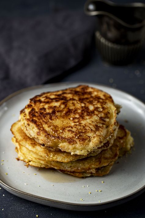 These Cornmeal Pancakes are light and fluffy and are perfect drizzled with syrup and topped with warmed salted butter! It's the ultimate comfort food that is ready in just under 30 minutes form start to finish! Also called Johnny Cakes or Hoe Cakes, these cornmeal pancakes can be served either sweet or savory as they are made with very little sugar. #wenthere8this #cornmealpancakes #johnnycakes #hoecakes Corncakes Recipe, How To Make Cornmeal, Johnny Cakes Recipe, Candied Cherries, Johnny Cakes, Cornmeal Recipes, Sweet Corn Recipes, Cornmeal Pancakes, Johnny Cake