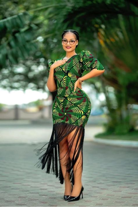 A lady wearing a Fringe Ankara gown Ankara Long Gown Styles For Ladies, Simple Ankara Gowns, Latest Ankara Short Gown, Kitenge Designs, Dress African Print, Ankara Short, Ankara Short Gown Styles, Ankara Long Gown Styles, Paris Tour