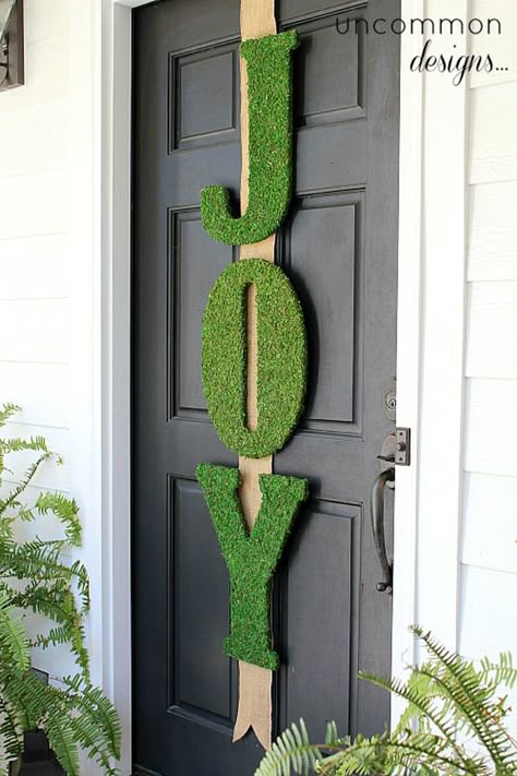 Though certainly perfect for Christmas, these DIY letters are pretty enough to hang on your front door year-round. Chrismas Diy, Joy Letters, Letters Christmas, Christmas Door Decoration, Front Door Christmas Decorations, Christmas Crafty, Fake Grass, Christmas Front Doors, Holiday Door