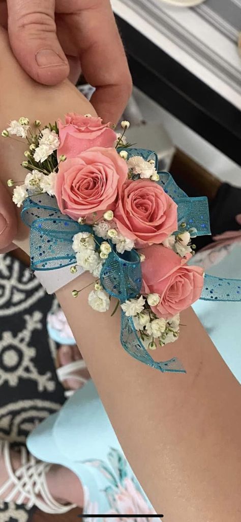 Pink And Blue Prom Flowers, Unique Prom Corsage Ideas, Aqua Corsage Prom, Teal And Pink Corsage, Light Blue And Pink Corsage, Iridescent Wrist Corsage, White And Teal Corsage, Wristlet Corsage, Diy Wrist Corsage