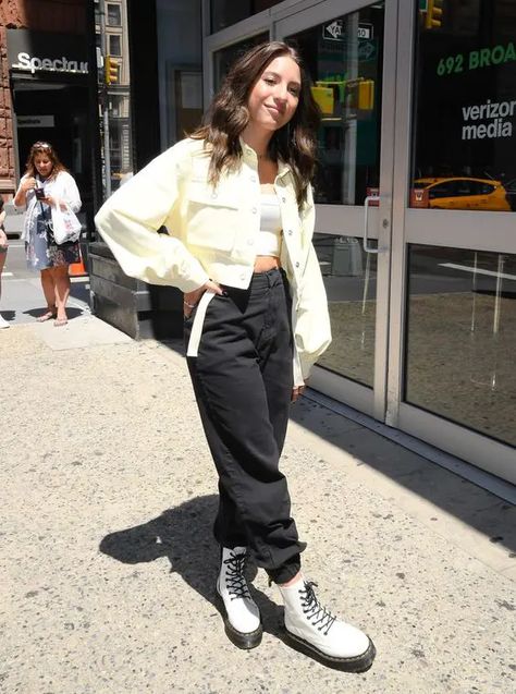 a white crop top, black cargo pants, white combat boots, a yellow shirt jacket for the fall How To Style White Doc Martens, Outfit With Combat Boots, White Combat Boots Outfit, White Doc Martens Outfit, Combat Boot Outfits, Combat Boot Outfit, White Doc Martens, White Boots Outfit, White Combat Boots