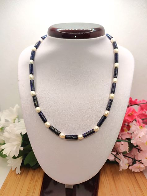 Made to a standard length of 16. inches with Natural Lapis Lazuli tubes and rice shaped freshwater pearls. this necklace is light and dainty and has a Sterling Silver lobster clasp. Lapis Beaded Necklace, Lapis Lazuli Necklace With Spacer Beads, Traditional Lapis Lazuli Bead Necklace, Elegant Lapis Lazuli Beaded Necklace, Lapis Lazuli Necklace With Faceted Beads, Howlite Bracelet, Lapis Necklace, Crystal Healing Bracelets, Healing Bracelets