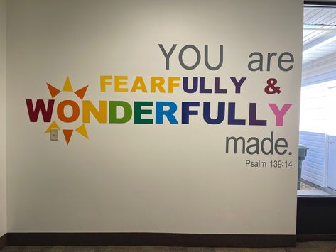 Rainbow letters Creation Mural Bible, Sunday School Wall Murals, Preschool Rooms Ideas, Classroom Wall Mural Ideas, Children’s Ministry Church Decor, Church Toddler Room Ideas, Teen Sunday School Room Decor, Sunday School Mural, Daycare Wall Painting Ideas