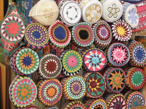 These hats are found in Nubia near the city of Aswan and are still worn by Nubian men. They can also be found in Cairo’s bazaars such as the Khan el-Khalili bazaar. Egyptian Crafts, Trumpet Lily, Egypt Culture, Egypt Tours, Luxor Egypt, Heirloom Quilt, Egyptian Pharaohs, Visit Egypt, Egyptian Culture