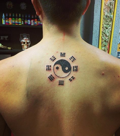 Yin Yang tattoo with the I-Ching symbols. There are a lot of types of Yin Yang tattoo and this is one part where it combines with another element which is the I-Ching. Small Cross Tattoos, Yin Yang Tattoo, Ying Yang Tattoo, Tattoo Placements, Yang Tattoo, Korean Tattoos, Yin Yang Tattoos, Cross Tattoo For Men, Tattoo Inspiration Men