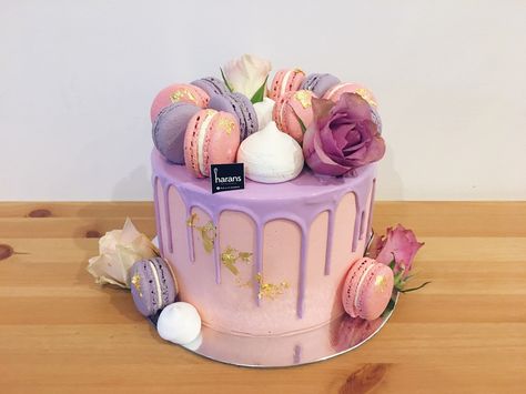 Blush pink buttercream baby shower cake with lilac purple chocolate drip, gold foil, macarons & meringue kisses #haranspatisserie Birthday Cake Pink And Purple, Lilac Birthday Cake, Pink And Lilac Cake, Birthday Cake Lilac, Pink And Purple Cake, Lilac Cake, Purple Cake With Macarons, Pink And Purple Buttercream Cake, Pink And Purple Drip Cake