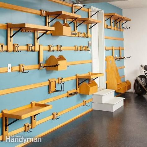 These garage storage system uses french cleats to allow it to be fully customizable. Garage Setup, Work Garage, Garage Wall Storage, Plan Garage, Overhead Garage Storage, Tool Board, Garage Storage Shelves, Garage Storage Solutions, The Family Handyman