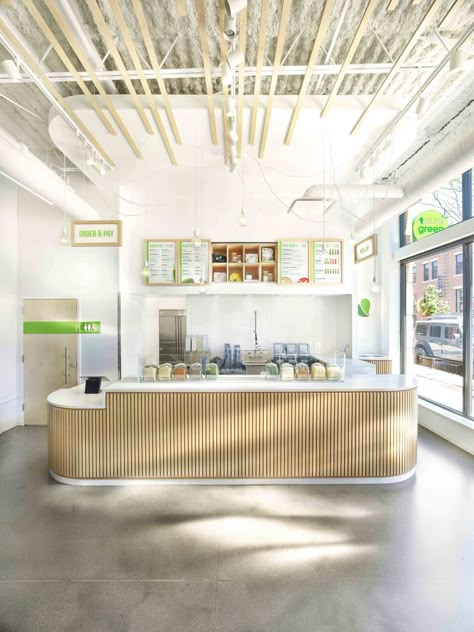 Interior design work for Pure Green juice and smoothie bar franchise locaiton in Chicago, IL. Point of sale retail counter in a modern minimalist neutral design style. Smoothie Bar Interior Design, Modern Juice Bar, Juice Bar Interior, Healthy Restaurants, Hut Design, Juice Bar Design, Bar Counter Design, Cafe Counter, Retail Counter