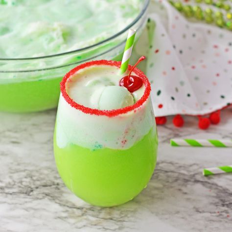 This Grinch Punch is the perfect drink for your holiday parties! Filled with the delicious flavors of lime sherbet, Sprite and Green Berry Punch, this fun Christmas drink will have everyone coming back for seconds! Grinch Punch Recipe, Grinch Recipes, Fun Christmas Drinks, Creamsicle Milkshake, Grinch Punch, Sherbet Punch, Lime Sherbet, Christmas Punch Recipes, Berry Punch