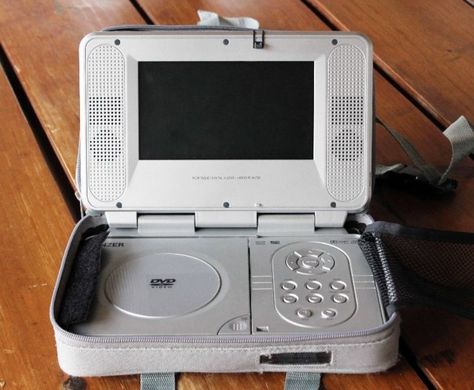 Portable DVD Player 7" with built in sound and twin headphone sockets. Comes with carry bag, attachment straps for in-car entertainment. Also has rechargeable battery pack, car power adaptor and AC adaptor. Complete and in excellent condition. Contact Eddie 0836273002 Vhs Player, Portable Cd Player, Retro Gadgets, Portable Dvd Player, Blu Ray Player, Video Home, Game Boy Advance Sp, Cd Player, Dvd Blu Ray