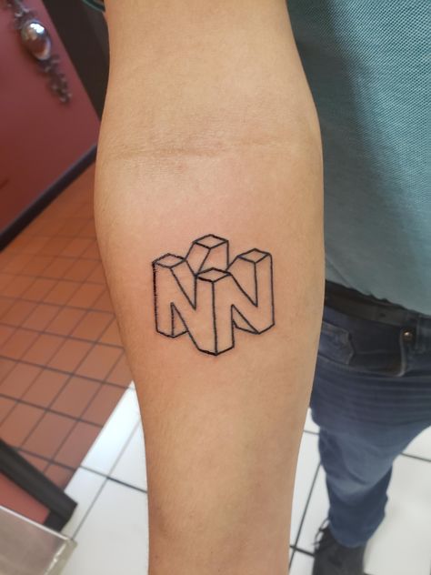 Traditional Gamer Tattoos, Minimal Zelda Tattoo, N64 Controller Tattoo, Simple Video Game Tattoos, Paper Mario Tattoo, N64 Tattoo, Nintendo Tattoo Ideas, Gaming Tattoo Ideas, Nintendo Tattoos