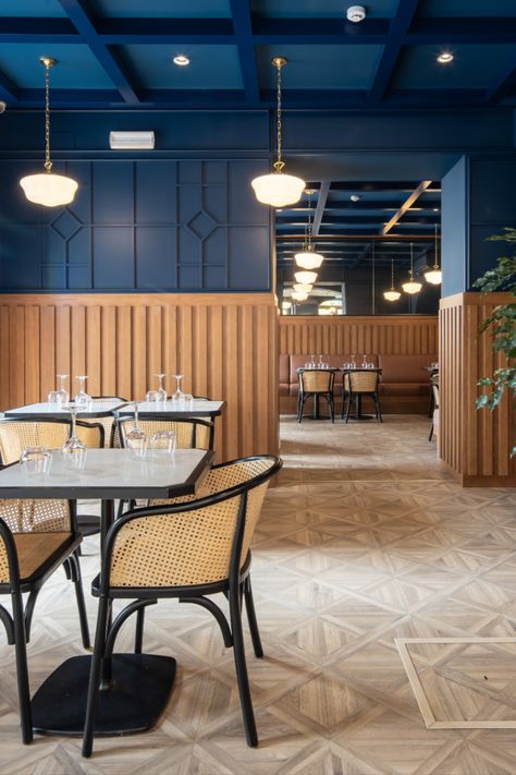 Navy Restaurant Interior, Blue And Gold Restaurant Design, Deep Blue Interior Design, Blue And Yellow Restaurant Interior, Seafood Restaurant Interior Design, Blue Interior Restaurant, Blue Cafe Design, Blue Restaurant Interior, Blue Cafe Interior