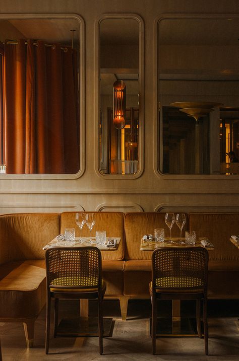 Paris's Nolinski restaurant harnesses a golden 1970s style - The Spaces Vintage Restaurant Interior, Spanish Restaurant Design, Curtains Restaurant, Restaurant Curtains, Art Deco Wall Panelling, Modern French Bistro, Art Deco Restaurant, Restaurant Seating Design, Restaurant Inspiration