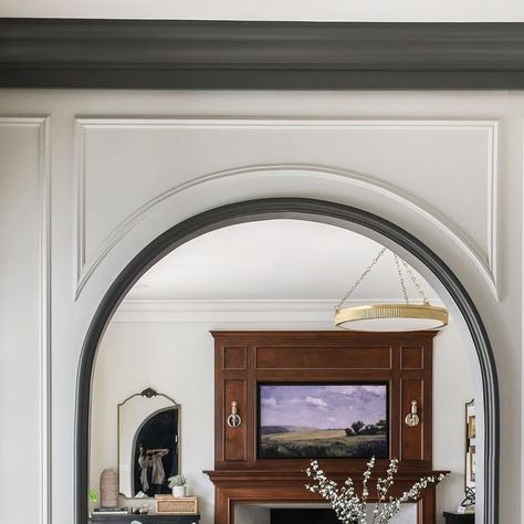 Park & Oak on Instagram: "You know how we love dark and moody, but sometimes you need a little brightness, especially in this entry. By adding white paint, moulding and a large arched opening to the living room, we added some much needed brightness to this mid-century home. #POglenellynrefresh GC: @pattersonpaintingremodeling" Molding Around Arched Doorway, Arch Box Moulding, Arched Molding On Wall, Archway Moulding, Black Archway, Painted Archway, Restored Homes, Modern Victorian Farmhouse, Archway Molding