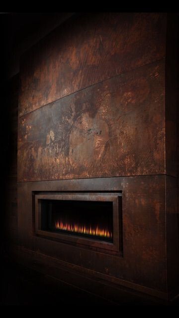 Patina Copper Backsplash, Black Copper Living Room, Copper Wall Panels, Metal Fireplace Wall, Copper Tile Fireplace, Copper In Interior Design, Rustic Metal Fireplace, Copper Sheets Projects, Copper Fireplace Surround