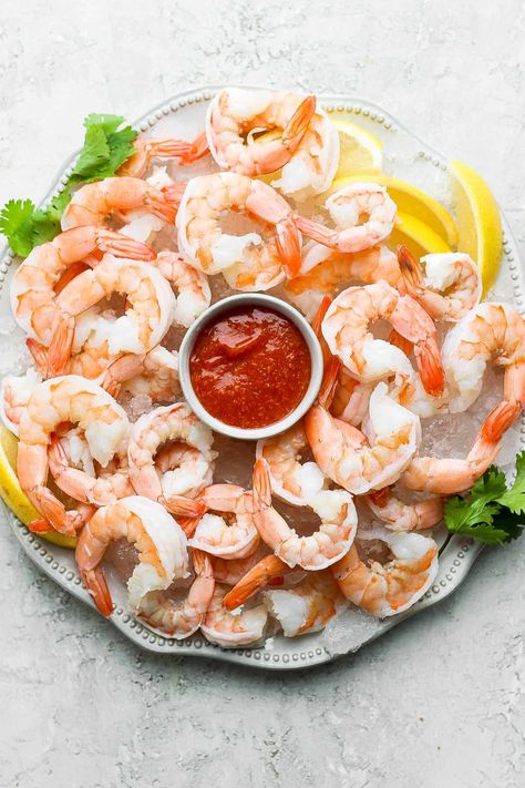 Classic Shrimp Cocktail - a delicious and easy shrimp cocktail recipe (with cocktail sauce recipe) - the perfect appetizer for any occasion! #shrimpcocktail #shrimpcocktailrecipe #shrimpcocktaildisplay #shrimpcocktailpresentation #shrimpcocktailsauce Shrimp Cocktail Presentation, Shrimp Cocktail Display, Shrimp Cocktail Recipe Easy, Easy Shrimp Cocktail, Shrimp Bites, Cold Shrimp, Shrimp Cocktail Recipe, Shrimp Cocktail Sauce, Wooden Skillet