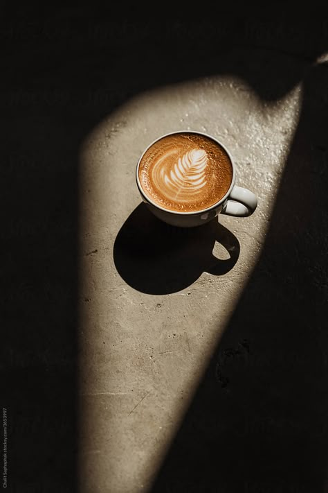 A Cup Of Coffee Latte On The Cement Floor In Sunlight by Chalit Saphaphak Tea Cup Photo, Coffee Cafe Photography, Coffee Cup Photography, Coffee Photography Ideas, Coffee Shop Modern, Coffee Moodboard, Coffee Marketing, Coffee Photoshoot, Euphoria 2