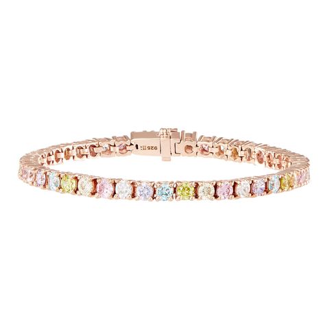 Add a hint of colour with our Tennis Bracelet. A simple but elegant design embellished in Pastel Rainbow Cubic Zirconia stones. 2.5 micron plated 18ct Rose Gold on Sterling Silver with a safety clasp fastening and available in 16cm (S/M) or 19cm (M/L). Complete your look with our Rose Gold Pastel Rainbow Tennis Necklace. To secure your bracelet:1- Slide the rod into the clasp until the t-bar is secure in the insert.2- Push up the latch until it clicks into place and sits flush with the clasp. To Rainbow Jewelry, Jewelry Website, Rainbow Bracelet, Jewelry Accessories Ideas, Stacked Jewelry, Tennis Necklace, Rainbow Color, Girly Jewelry, Dream Jewelry