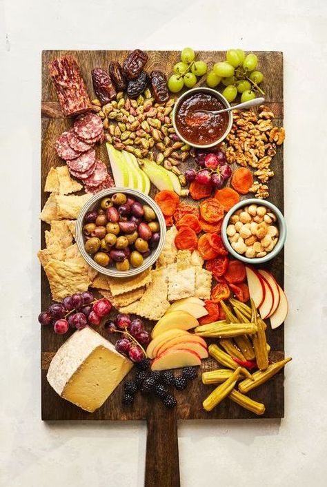 This is our Southern guide to charcuterie boards, with tips for what to buy and how to build the perfect board. #recipeideas #recipes #charcuterieboard #southernliving Southern Style Charcuterie Board, Style Charcuterie Board, Beautiful Cheese Board, Impressive Appetizers, Pickled Okra, Best Appetizer Recipes, Snack Board, Sweet Heat, Cured Meats