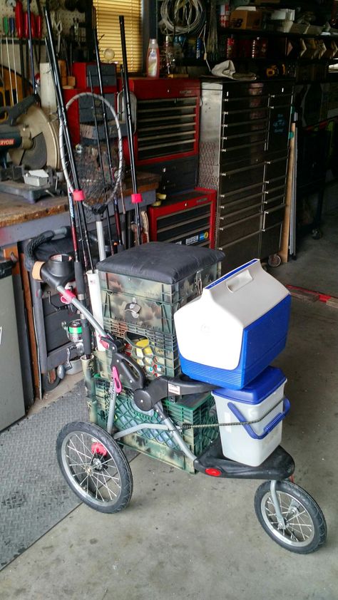 Fishing Tackle cart with lots of storage from stroller and milk crates Milk Crate Fishing Ideas, Fishing Cart Diy, Fishing Trolley, Milk Crates Diy, Bicycle Fishing Rod Holder, Beach Fishing Cart, Fishing Rod Carrier, Fishing Pole Holder For Truck, Fishing Gear Storage