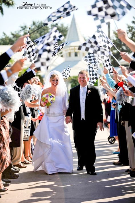 race flag weddings | Staged exit complete with racing flags Race Car Wedding, Checkered Flag Wedding, Mechanics Wedding, Racing Wedding, Car Themed Wedding, Weddings Idea, Wedding Exit, Sisters Wedding, Wedding Exits