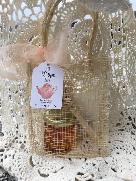 "Did someone say \"tea party\"? Nothing would be cuter than these favors at your party(besides the Dormouse or the March Hare)! Super special favors for your wedding and/or shower! Includes two tea bags with your choice of several different unique teas or a mini tin of 5 sachets , a 1.5 oz glass jar filled with Local VT honey and a mini version ( 4 inch) of a wooden honey dipper Convo me with how many you need, your location and your details and I will set up a custom listing;) Please allow two Bridal Shower Tea Party Theme, Tea Party Favor, The March Hare, Adult Tea Party, Tea Favors, Honey Wedding, Bridal Tea Party, Blooming Tea, Tea Party Favors