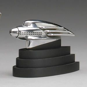 A rare 1936 'streamliner' Hupmobile mascot designed by Raymond Loewy, Streamlining Design, Raymond Loewy Design, Robot Project, Car Mascot, Streamline Art, Deco Statue, Car Hood Ornaments, Raymond Loewy, Art Deco Inspiration