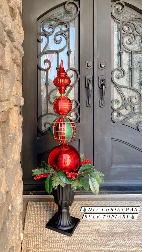 diyfrenchfarmhouse on Instagram: ❤️💚So many things are flying off of the shelves this year...I wanted to share this DIY Christmas Bulb Topiary with you all while the… Christmas Ball Topiary Ornament Tree, How To Make Christmas Topiary, Christmas Ball Topiary Diy, Christmas Finials Diy, Topiary Christmas Tree, Christmas Topiary Outdoor Diy, Diy Topiary Ball, Christmas Ornament Topiary Diy, Diy Christmas Topiary Front Doors