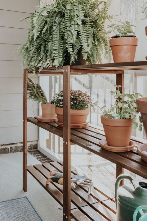 An easy IKEA potting table hack.  See how I turned an IKEA shelving unit into a simple potting bench for planting herbs and flowers. Outdoor Hanging Plants, Ikea Plant Stand, Plant Shelves Outdoor, Ikea Shelving, Ikea Garden, Ikea Shelving Unit, Flowers Balcony, Ikea Plants, Ikea Outdoor